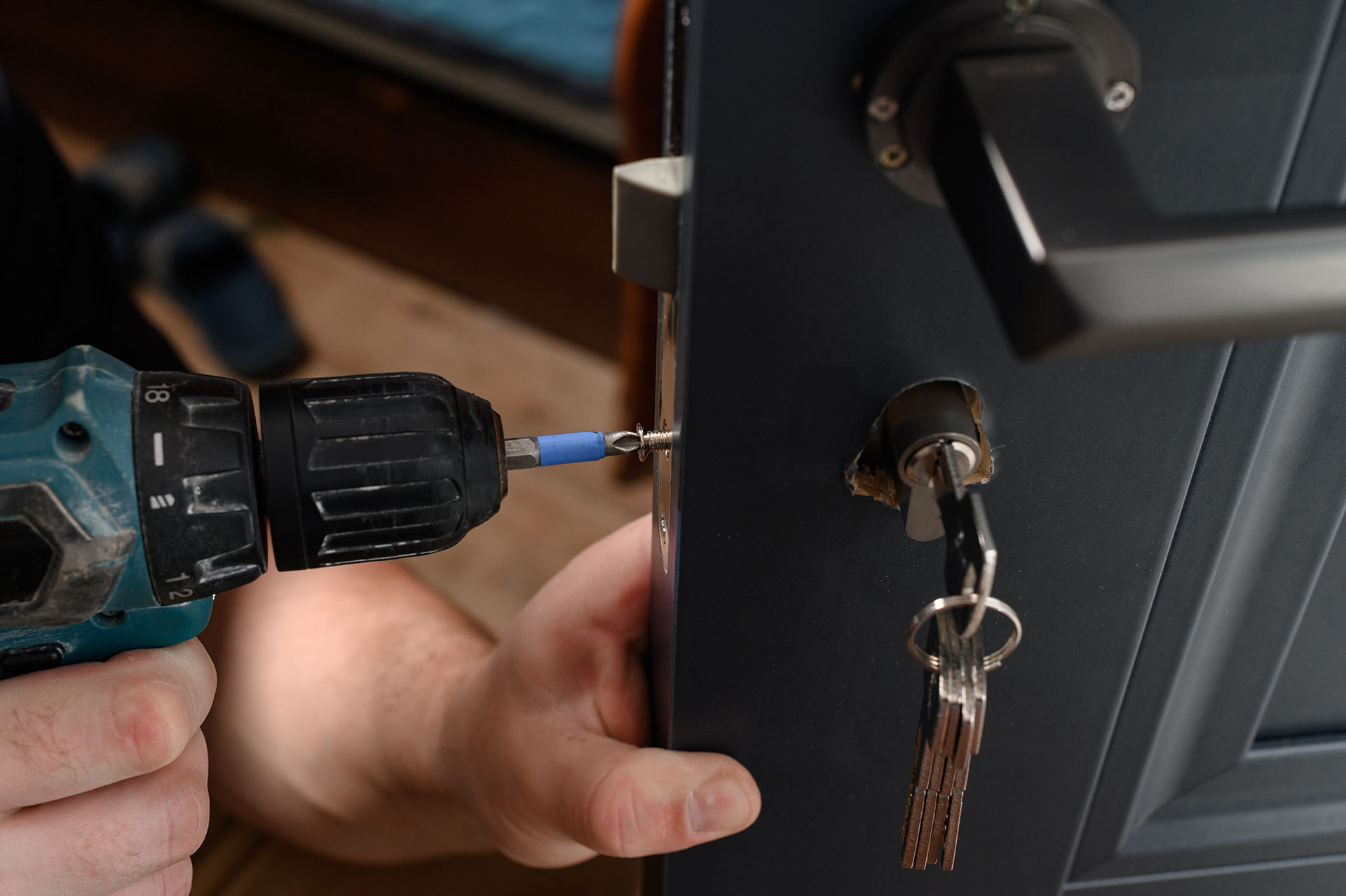Residential Locksmith attending an emergency lock repair